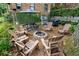 Community seating area with Adirondack chairs around a fire pit at 677 Somerset Ne Ter # C6, Atlanta, GA 30306