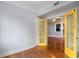 Light-filled living room offers hardwood floors and striking yellow French doors to adjoining rooms at 677 Somerset Ne Ter # C6, Atlanta, GA 30306