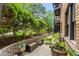 Secluded patio with lush landscaping and seating at 677 Somerset Ne Ter # C6, Atlanta, GA 30306