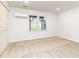 Bright bedroom with neutral carpet, white walls, and a large window, a great place to relax and recharge at 911 Lenox Hill Ne Ct, Atlanta, GA 30324