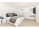 White bedroom with big windows, neutral carpet and a view of the outside at 911 Lenox Hill Ne Ct, Atlanta, GA 30324