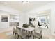 Open-concept dining area with views of the kitchen and home office at 911 Lenox Hill Ne Ct, Atlanta, GA 30324