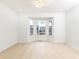 Sunlit room with a large bay window and modern, recessed lighting at 911 Lenox Hill Ne Ct, Atlanta, GA 30324