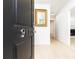 Bright entryway featuring a modern light wood floor, and a gold trimmed mirror at 911 Lenox Hill Ne Ct, Atlanta, GA 30324
