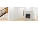 Modern fireplace in a bright living space, with light wood flooring at 911 Lenox Hill Ne Ct, Atlanta, GA 30324