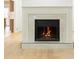 Close-up of the fireplace with a decorative mantel and wood flooring at 911 Lenox Hill Ne Ct, Atlanta, GA 30324