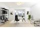 Bright office with a large bay window, modern shelving, and neutral decor at 911 Lenox Hill Ne Ct, Atlanta, GA 30324