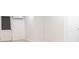 Bright room with light-colored walls and flooring, complemented by a white door at 911 Lenox Hill Ne Ct, Atlanta, GA 30324