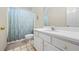 Clean bathroom featuring a toilet, shower curtain, and vanity at 115 Stonewall Dr, Covington, GA 30016
