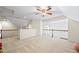 The bonus room offers flexible space for recreation and a lounge area at 115 Stonewall Dr, Covington, GA 30016