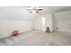 Bonus room boasts carpet floors, a ceiling fan, and storage at 115 Stonewall Dr, Covington, GA 30016