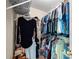 Organized walk-in closet with rods and shelves for ample storage at 115 Stonewall Dr, Covington, GA 30016