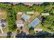 Aerial view of community amenities including a pool, splash pad, tennis courts, and playground at 115 Stonewall Dr, Covington, GA 30016