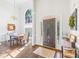 Welcoming foyer area featuring wood flooring and ample natural light at 115 Stonewall Dr, Covington, GA 30016