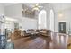 Spacious living room with high ceilings, hardwood floors, and an open floor plan at 115 Stonewall Dr, Covington, GA 30016