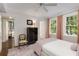 Bedroom with crown moulding, natural light, and refined decorative appointments at 1325 Peachtree Ne St # 401, Atlanta, GA 30309