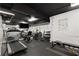 Spacious in home gym with work out equipment and accessories including a treadmill, elliptical and weights at 1325 Peachtree Ne St # 401, Atlanta, GA 30309