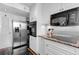 Bright kitchen features stainless steel appliances, granite countertops, and white cabinetry at 1325 Peachtree Ne St # 401, Atlanta, GA 30309