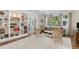 Bright living room with built-in shelving, hardwood floors, and open layout design at 1325 Peachtree Ne St # 401, Atlanta, GA 30309
