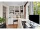 Cozy office space with a large window with natural light and built-in shelving and storage at 1325 Peachtree Ne St # 401, Atlanta, GA 30309
