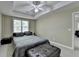 Comfortable bedroom with a large window and natural light at 1875 Briergate Dr, Duluth, GA 30097