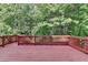 Spacious deck with wood railing, perfect for outdoor relaxation and entertaining friends and Gathering at 1875 Briergate Dr, Duluth, GA 30097