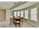 Inviting dining area with large windows and natural light at 1875 Briergate Dr, Duluth, GA 30097