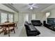 Spacious living room with a ceiling fan and comfortable seating at 1875 Briergate Dr, Duluth, GA 30097