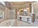 Large main bathroom features a soaking tub, walk-in shower, and white cabinets at 1875 Briergate Dr, Duluth, GA 30097