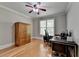 Functional home office with hardwood floors, natural light, and ample workspace at 1875 Briergate Dr, Duluth, GA 30097