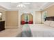 Spacious main bedroom boasts a sitting area, tray ceilings, and ample natural light, providing comfort at 4114 Suwanee Trail Dr, Buford, GA 30518