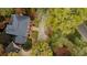 Aerial view of home showcasing mature trees, long driveway, and meticulously landscaped yard at 769 Hampton Sw Pl, Marietta, GA 30064