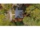 Aerial view of the home surrounded by lush greenery, mature trees, and manicured grounds at 769 Hampton Sw Pl, Marietta, GA 30064