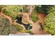 Backyard with brick path, pond, and thoughtful landscaping creating a serene and private outdoor space at 769 Hampton Sw Pl, Marietta, GA 30064