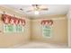 Bedroom featuring carpet floors, crown molding, and two windows at 769 Hampton Sw Pl, Marietta, GA 30064