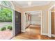 Elegant foyer with hardwood floors, chandelier, and an open view into the formal dining room at 769 Hampton Sw Pl, Marietta, GA 30064