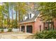 Two-car detached garage with classic brick exterior and black carriage doors at 769 Hampton Sw Pl, Marietta, GA 30064