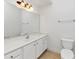 Bright bathroom features white cabinets, a white counter, large mirror and ceramic tile flooring at 104 Highlands Ridge Se # 1, Smyrna, GA 30082
