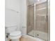 Bathroom features a glass-enclosed shower with tile surround and a modern commode at 104 Highlands Ridge Se # 1, Smyrna, GA 30082