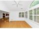 Bright dining room with wood floors, white walls and windows with white shutters overlooking the landscaped yard at 104 Highlands Ridge Se # 1, Smyrna, GA 30082