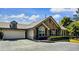 Charming single-story home featuring stone accents, a two-car garage, and well-maintained landscaping at 104 Highlands Ridge Se # 1, Smyrna, GA 30082