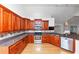 Kitchen with wood floors, wood cabinets, stainless steel appliances and granite countertops at 104 Highlands Ridge Se # 1, Smyrna, GA 30082