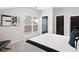 Inviting bedroom with a well-lit window and minimalist decor, providing a calming and restful retreat at 522 Pearl St, Cumming, GA 30040