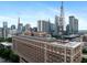 Expansive aerial view featuring historic architecture against a modern cityscape, blending old and new charm at 800 Peachtree Ne St # 8509, Atlanta, GA 30308