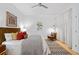 Bedroom features a ceiling fan, modern decor, wood floors and ample natural light at 800 Peachtree Ne St # 8509, Atlanta, GA 30308