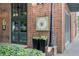 Brick building exterior with Cypress Street Pint & Plate signage, enhancing the urban charm and curb appeal at 800 Peachtree Ne St # 8509, Atlanta, GA 30308