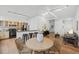 Open concept living space features kitchen, dining area, and comfortable sitting area, great for modern living at 800 Peachtree Ne St # 8509, Atlanta, GA 30308