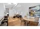 Open living space with dining area, comfortable sofa, and modern decor, perfect for entertaining and relaxing at 800 Peachtree Ne St # 8509, Atlanta, GA 30308