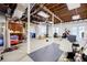 Unfinished basement featuring exposed ceiling, workout area, and ample storage, offering potential for customization at 1550 Masters Club Dr, Sandy Springs, GA 30350