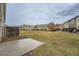 Spacious backyard is surrounded by a wooden fence at 1963 Lakeshore Overlook Nw Cir, Kennesaw, GA 30152